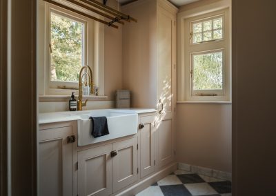 Pink shaker style cabinetry