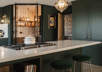 Dark green handpainted cabinetry